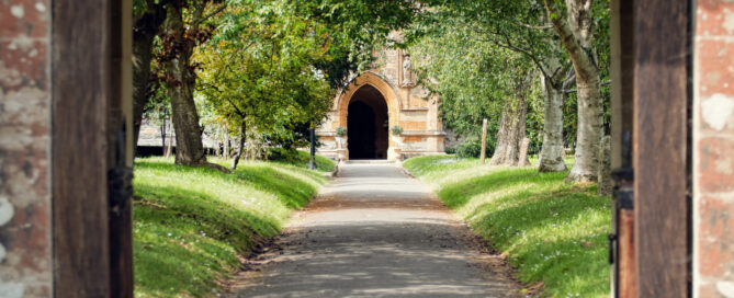 Church Path. Peaceful tree lined pathway through churchyard.